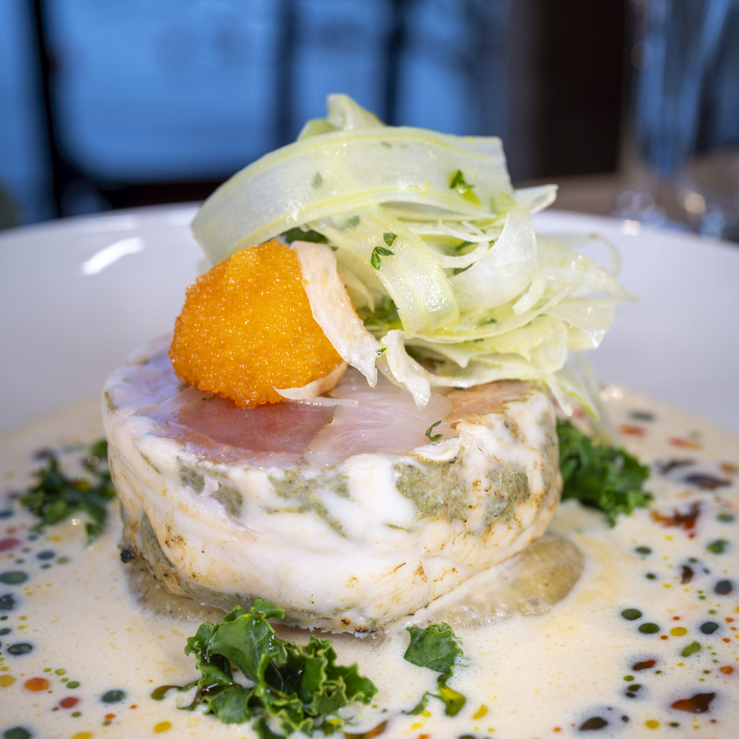 A beautifully plated dish, carefully garnished and presented.